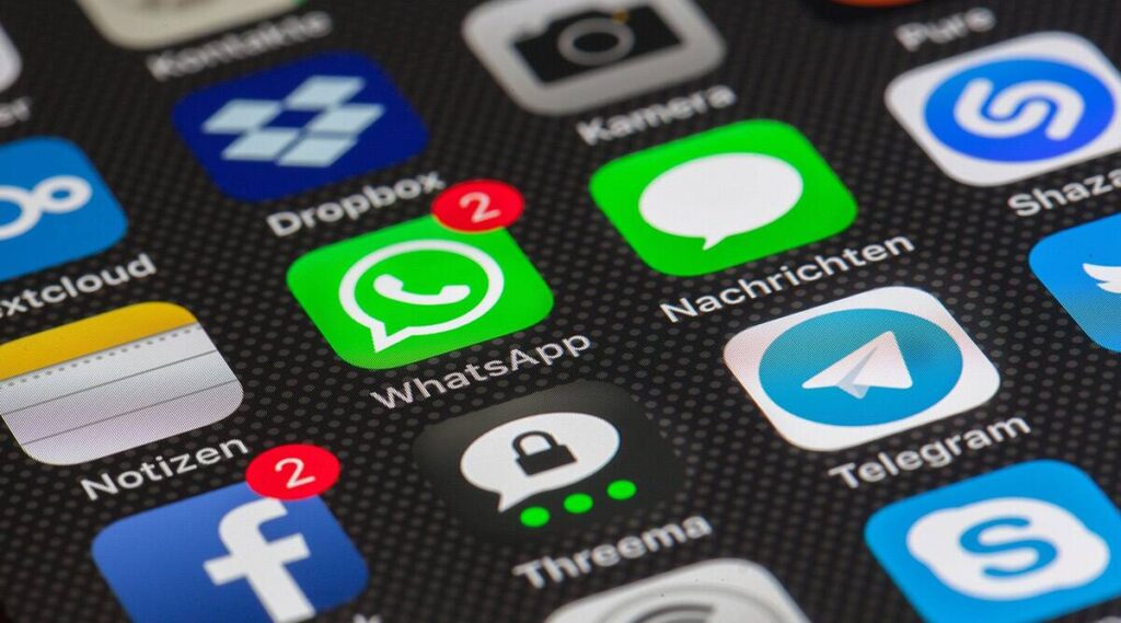 This picture shows a phone screen with Whatsapp, Telegram and Messenger apps.